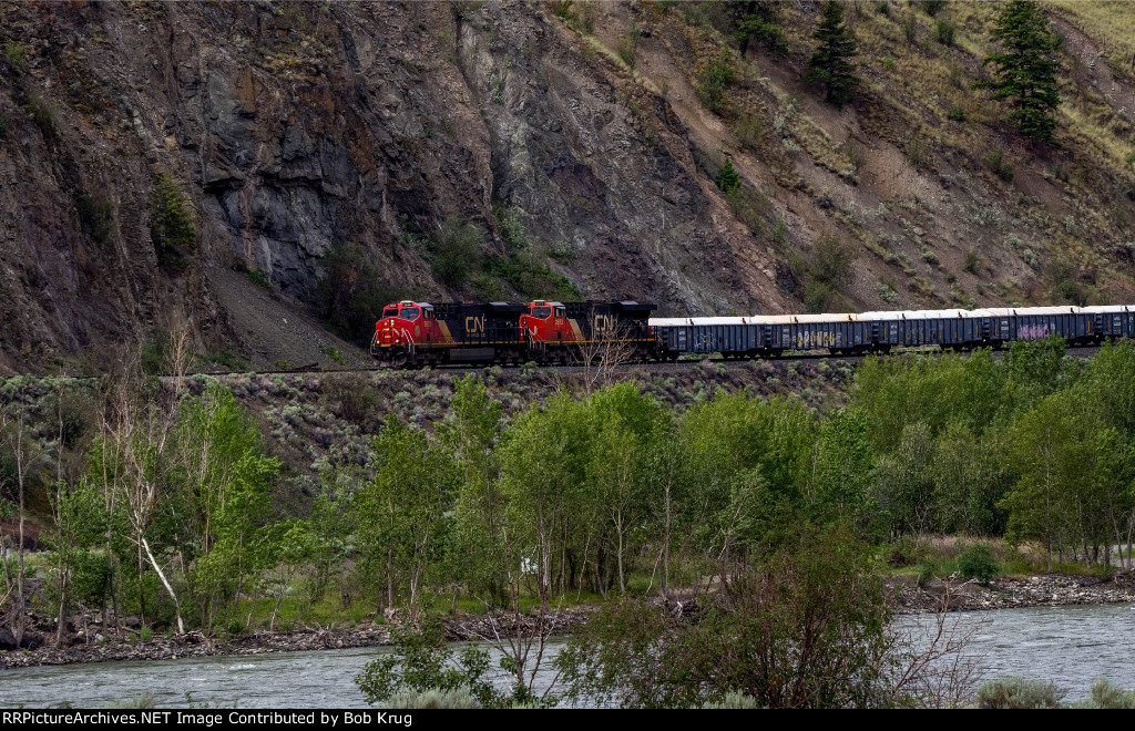 CN freight train eastbound up the Thompson River Gorge